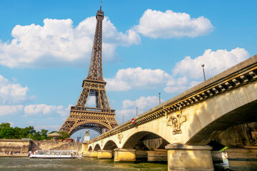 Fototapeta na wymiar Jena Bridge and Eiffel Tower in the Sunny Weather