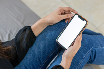 Mockup of a smartphone with a woman browsing on to it