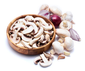 Fresh white champignon mushrooms in wooden bowl isolated on white background