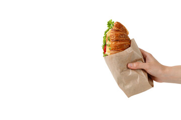 Croissant in a paper packaging bag mockup, take away food. Take away fresh french croissant with...