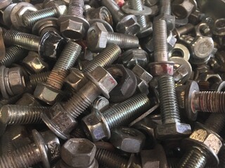 Old nut and bolts for background