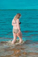 Plus size American woman at beach, enjoy the life. Life of people xxl size, happy nice natural beauty woman