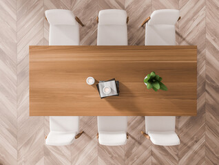 Top view of light meeting room interior with eating table and chairs