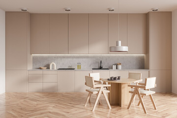 Light kitchen interior with eating table and seats on wooden floor