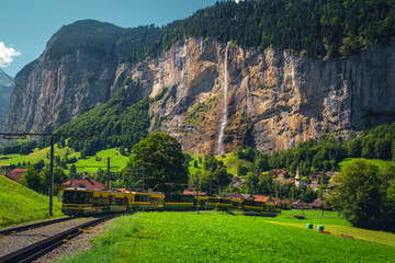 Modern electric cogwheel tourist train in the Lauterbrunnen valley, Switzerland