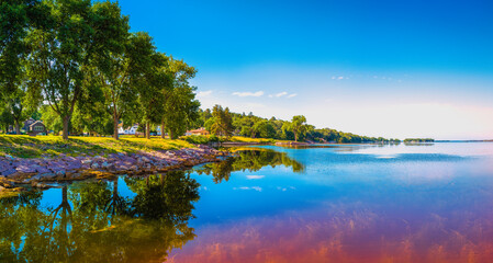 Tranquil sunset forest and marina landscape of Big Stone Lake in Ortonville,  Minnesota, USA.