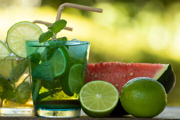 glass of mojito, tropical drink with mint and brown sugar