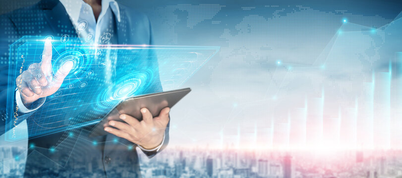 Global business and Smart technology concept, Businessman touching on world map virtual digital screen of logistics network distribution at city skyline, Logistics import export transport background