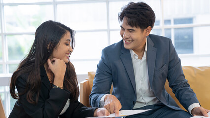 asian business couple at office