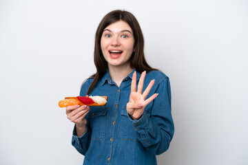 Young Russian woman holding sashimi isolated on white background happy and counting four with fingers