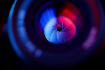 Camera lens aperture red and blue light
