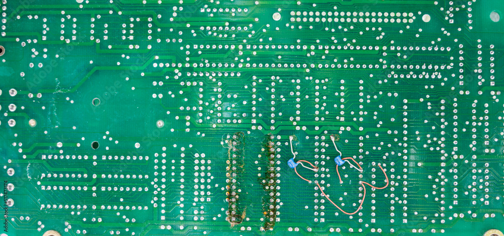 Poster Old computer chips that are out of order. Not working microshops with transistors, chips and conductors. Blue system board with microchips and transistors