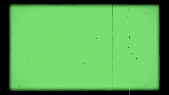 Old film look animation on green color. Film noise, flicker, scratches, dust, hair, light leaks and shake effects included. 4K. Retro film video footage. Chroma key.