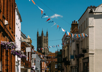 Juxtaposition view of Gothic Canterbury Cathedral, one of the oldest and most important Christian...