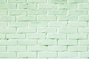 Brick wall with unusual green bricks