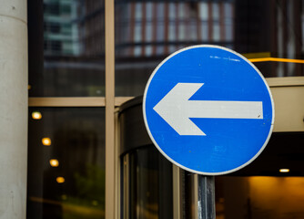 A one-way street sign with copy space