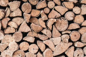Background image of a log prepared as firewood were arranged in an orderly manner