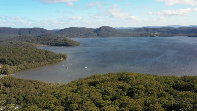 Aerial flying to Wallis lake in booti Booti national park of Australia as 4k.
