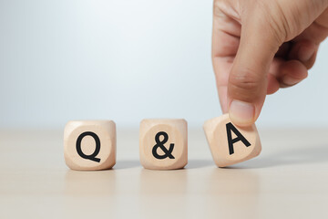 Question and Answer Concept. wooden block cube with text Q and A. communication information service.