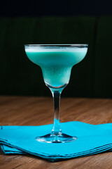 Swimming Pool Turquoise cocktail on the table