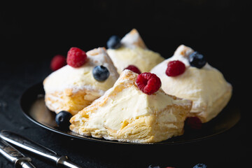 Puff pastry with cream and fresh berries