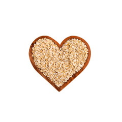 Avena sativa - Oat flakes in the heart shaped bowl