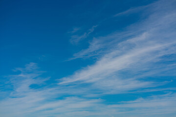 Amazing blue background with light haze of clouds