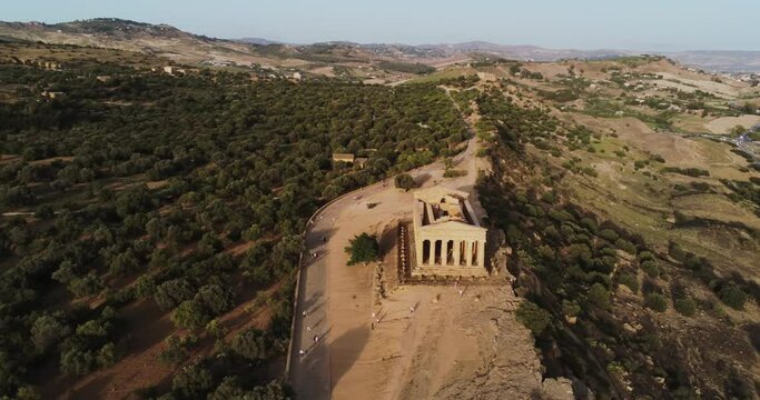 Aerial shot of the Greek Temple of Concordia at sunset in Sicily, Italy. valley of the temples in Agrigento.