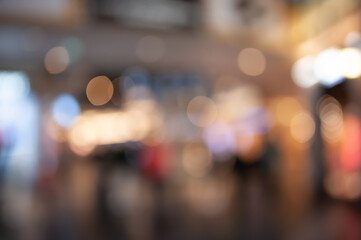 Blurred view of modern shopping mall interior