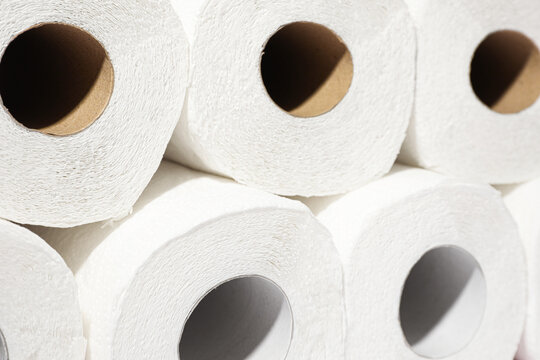 Many rolls of paper towels as background, closeup