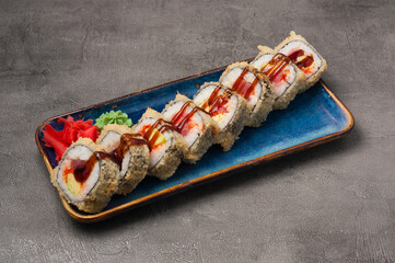 tempura sushi rolls with tuna and avocado with unagi sauce