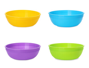 Set with colorful bowls on white background. Serving baby food