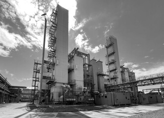 Production of oxygen and nitrogen from the air. Appearance of the distillation column and the main heat exchanger for air separation. Black and white photo