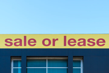 Property for sale banner displayed on the building facade in South Australia