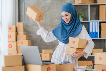 Beauty muslim woman in hijab working in the office