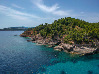 Aerial view over Chrisi Milia beach and the rocky surrounded area in Alonissos island, Greece