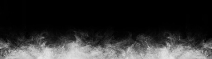 Abstract smoke texture frame over black background. Fog in the darkness. Natural pattern.