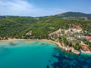 Fototapeta na wymiar Aerial view over Chrisi Milia beach and the rocky surrounded area in Alonissos island, Greece