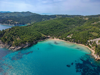 Obraz na płótnie Canvas Aerial view over Chrisi Milia beach and the rocky surrounded area in Alonissos island, Greece