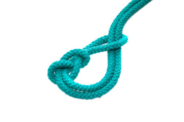 Knot on a cord isolated on a white background .