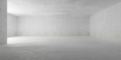 Abstract large, empty, modern concrete room, indirect light from behind wall on the left and rough floor - industrial interior background template