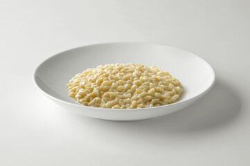White bowl with parmesan cheese risotto
