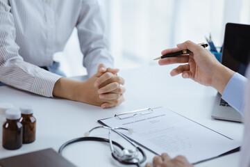 Doctors are giving advice on treatment to patients in hospital examination rooms, treating diseases from specialists and providing targeted treatment. Concepts of medical treatment and specialists.