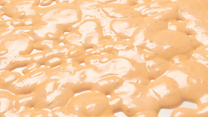 Whipped delicious sauce texture. Hamburger sauce background.
