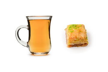 Turkish sweet baklava with turkish tea isolated on a white background.