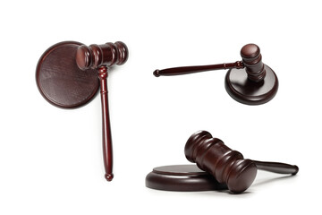 Wooden judge gavel and soundboard isolated on a white background.