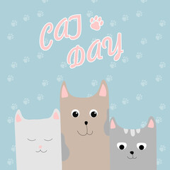 Happy Cat Day card. Three funny cats on a blue background.