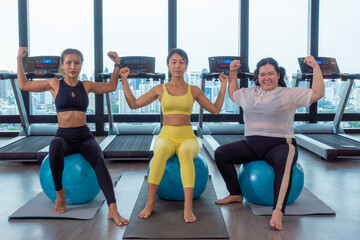 Fototapeta na wymiar Young Asian woman Flexible slim doing splits workout, practice yoga or pilates. Woman natural beauty and wellness 
