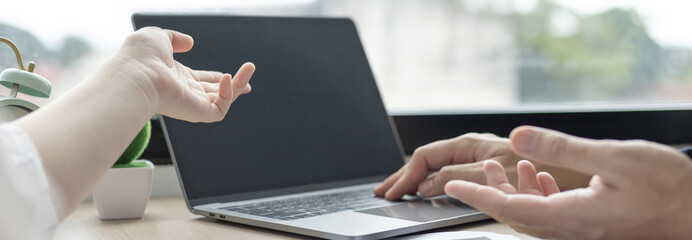 Business brainstorming, Marketers and conference leaders on business plans and marketing strategies using laptops for data analysis, Using business data graphs in meetings.