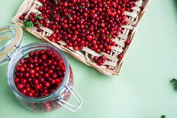 autumn berries on table, lingonberry raw closeup